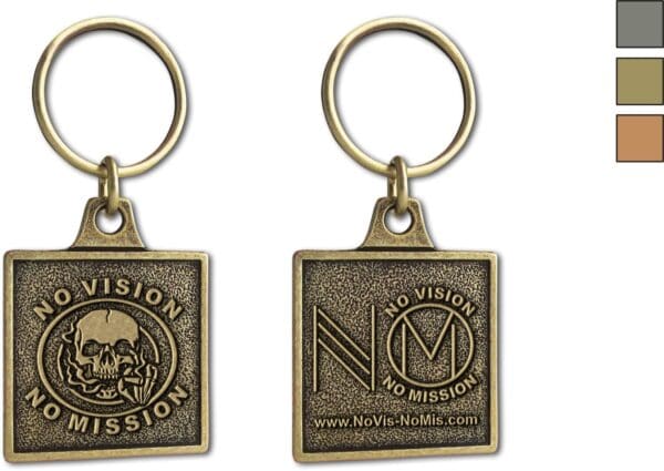 A keychain that says mission no vision no mistake