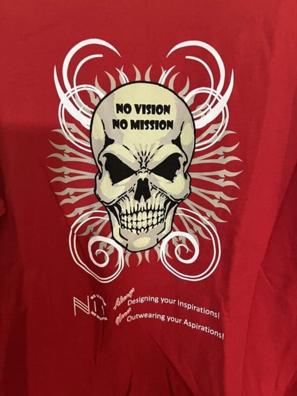 A red shirt with a skull and the words " no vision, no nation."